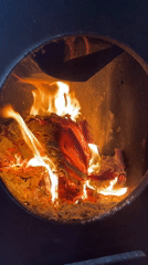 Cozy morning in Маминское: fire in the stove, cat on the blanket