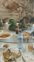Post-meal dining scene documented at Nigerian restaurant
