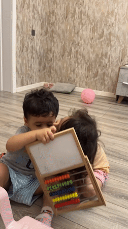 Kids playing and goofing around at home in Baku