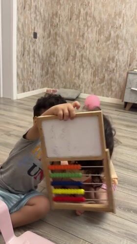 Kids playing and goofing around at home in Baku