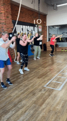 Woman documents fitness day with gym workout and daisy field photos
