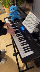 Late-night keyboard practice session recorded in Buenos Aires apartment