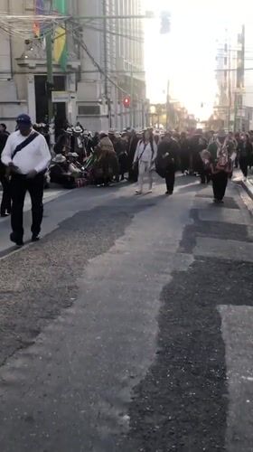 Traditional Andean performers gather on La Paz street