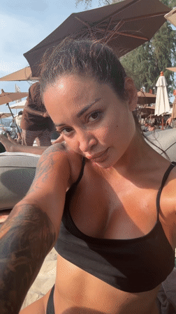 Woman takes selfie on Choeng Thale beach