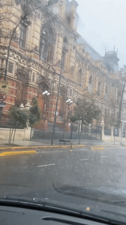 Rainy afternoon captured from vehicle in Buenos Aires
