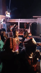 Nighttime pool party with live music documented in Awka, Nigeria