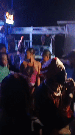 Nighttime pool party with live music documented in Awka, Nigeria