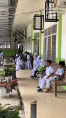 Students practice martial arts at Indonesian school courtyard