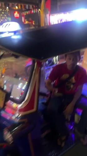 Illuminated tuk-tuk taxi spotted on Bangkok street