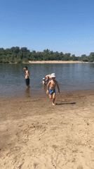 Sunny river beach day in Kilyakovka, Russia