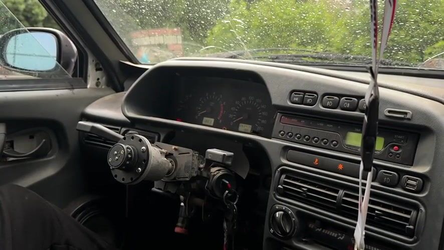Car interior views during rainy drive in Ufa