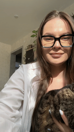 Woman documents daily life with cat in rural Russia