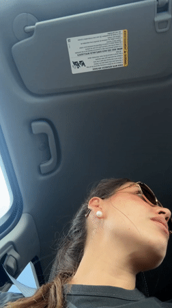 Woman drives through Schertz wearing sunglasses at night