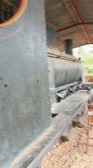 Visitor documents vintage transport exhibits at Jos Museum Nigeria