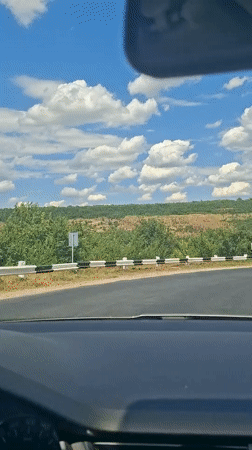 Coffee break on a scenic road through rural Moldova
