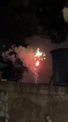 Nighttime fireworks display observed in Pampatar, Venezuela residential area