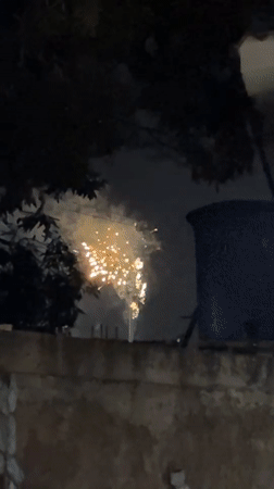 Nighttime fireworks display observed in Pampatar, Venezuela residential area