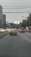 Wet road traffic documented in Mexico City overnight