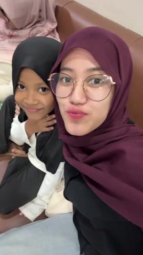Woman documents dental clinic visit with family in Indonesia