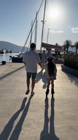 Father, daughter enjoy sunny afternoon at Tivat marina