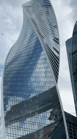 Glass skyscrapers filmed under overcast skies in Khimki, Russia