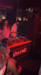 Night out at a North Kuta club, red lights and dancing
