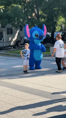 Community festival features Stitch mascot, bouncy castles, exotic birds
