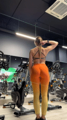 Woman exercises at Saint Petersburg gym in gradient leggings
