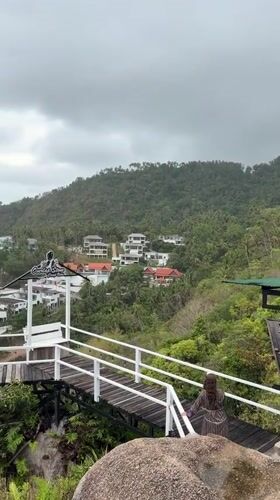 Tourists explore scenic Overlap Stone viewpoint on Ko Samui