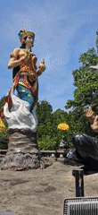 Cultural statues and wildlife observed in Denpasar waterways