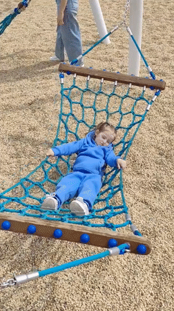 Family playground activities documented in Kazan during morning hours