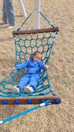 Family playground activities documented in Kazan during morning hours
