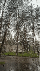 Rainy campsite afternoon viewed through a wet windshield, Tallinn