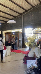 Wedding guests dance at outdoor celebration in Sidoarjo, Indonesia