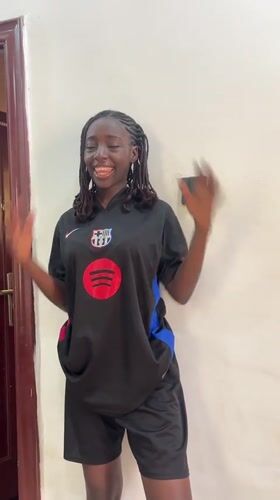 Casual moments documented in Abuja featuring Barcelona jersey selfies