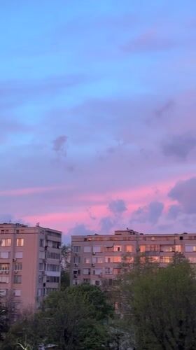Sunset captured over Yambol apartment buildings in Bulgaria