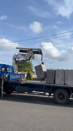Morning street maintenance operations documented in Badagry, Nigeria