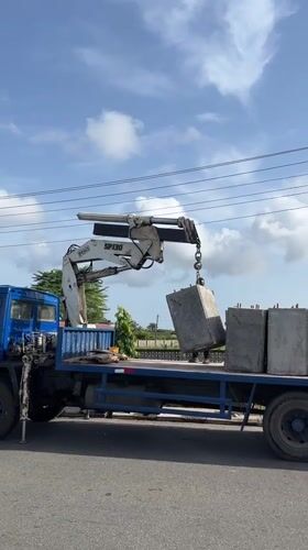 Morning street maintenance operations documented in Badagry, Nigeria