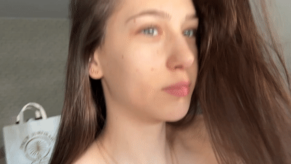 Woman takes morning selfies in Sofia apartment