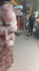 Everyday street life across a busy Selayang neighborhood