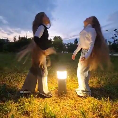 Evening stroll documented through central Kemerovo's illuminated streets and parks