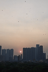 Mumbai residents capture sunset cityscape and outdoor family moment