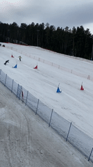 Snowboarders practice on marked course in Krasnoyarsk terrain park