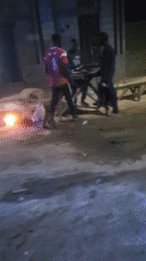 Evening scenes captured in Jogana: fires, gatherings, utility work
