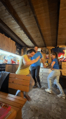 Group Dancing Celebration in Bulgarian Mountain Cabin