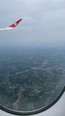 Passenger captures aerial views during flight over Jianyang City