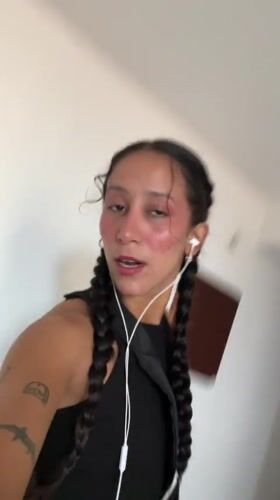 Dancing and talking to camera in a Porlamar room