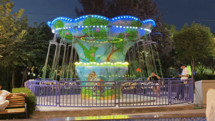 Tashkent park district lights up on a summer evening
