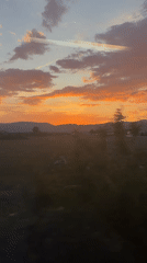 Sunset landscape captured from moving vehicle near Nikšić, Montenegro
