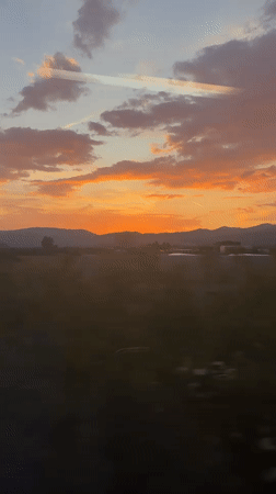 Sunset landscape captured from moving vehicle near Nikšić, Montenegro